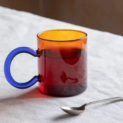 Amber Glass Mug with Blue Handle