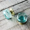 Set of Two Large Round Brass and Aqua Glass Door Knobs