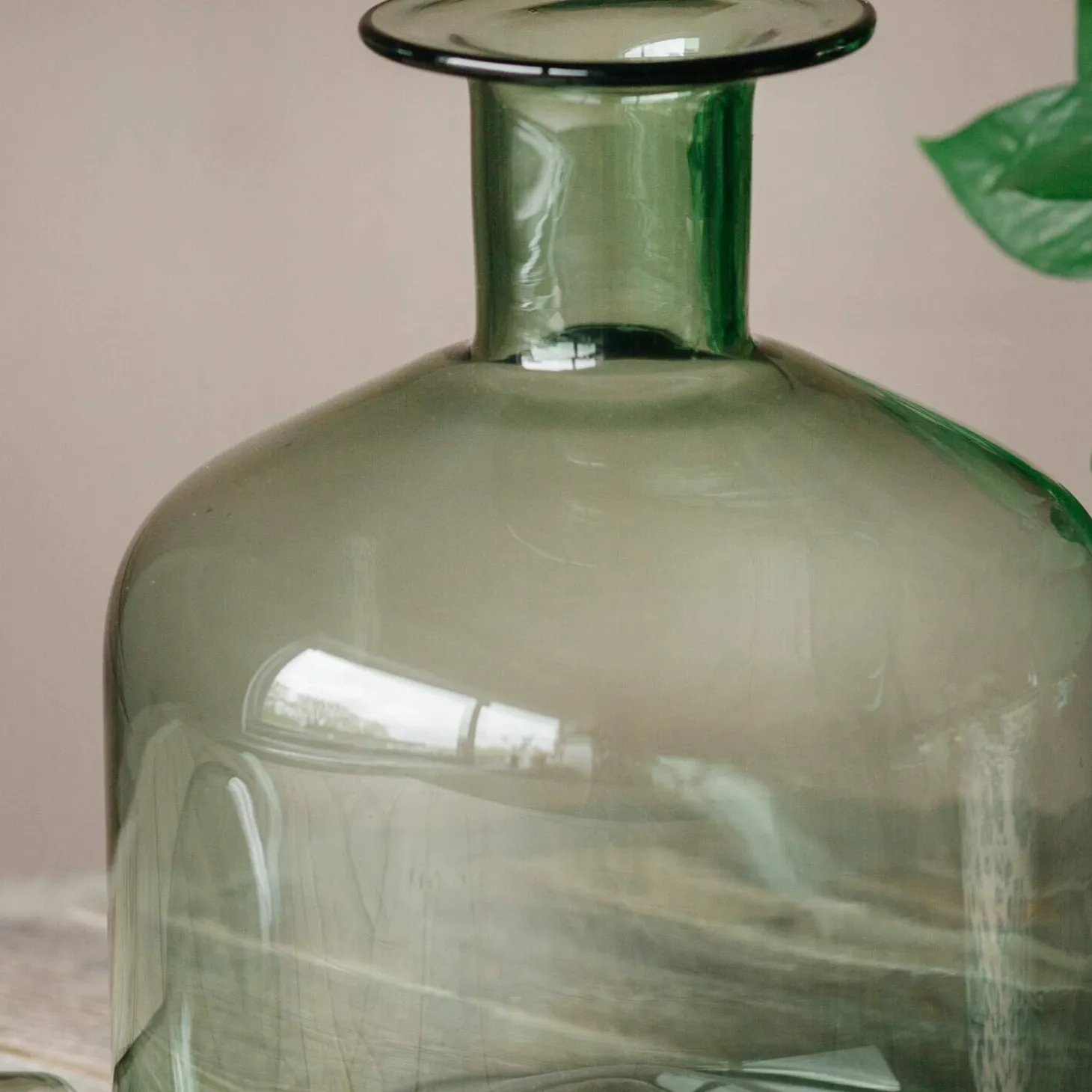 Wide Green Glass Bottle